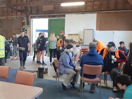 Volunteers enjoying a free lunch